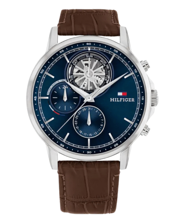 La montre GUESS GW0668L2 pour femme, issue de la collection Mod ID, combine élégance contemporaine et fonctionnalité raffinée. - 2025-06-20T060440.895 Montre Homme Tommy Hilfiger Stewart – Cadran Bleu – Bracelet Cuir Marron – Réf 1710629
