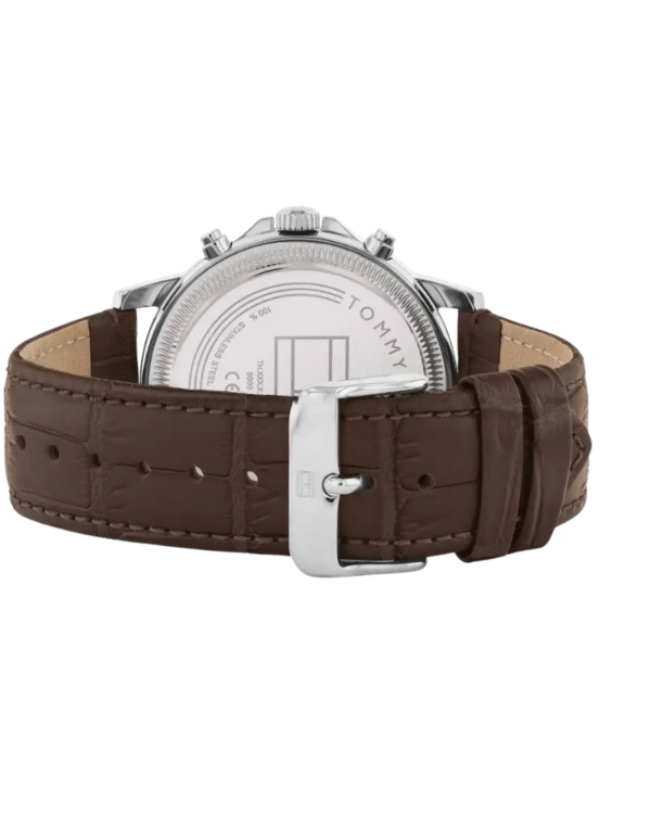 La montre GUESS GW0668L2 pour femme, issue de la collection Mod ID, combine élégance contemporaine et fonctionnalité raffinée. - 2025-06-20T060824.924 Montre Homme Tommy Hilfiger Stewart – Cadran Bleu – Bracelet Cuir Marron – Réf 1710629