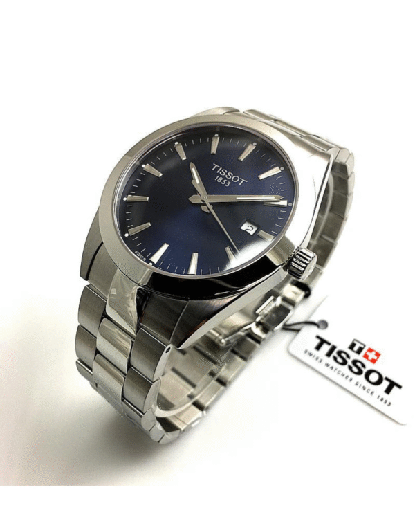 La montre GUESS GW0668L2 pour femme, issue de la collection Mod ID, combine élégance contemporaine et fonctionnalité raffinée. - 2025-07-08T181346.653 Tissot Gentleman T127.410.11.041.00 – Montre Homme 40 mm Acier & Cadran Bleu
